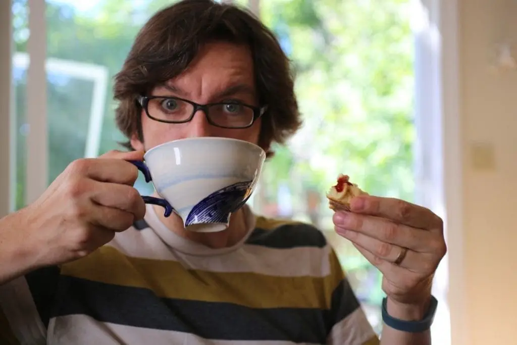 Matt enjoying scone and tea