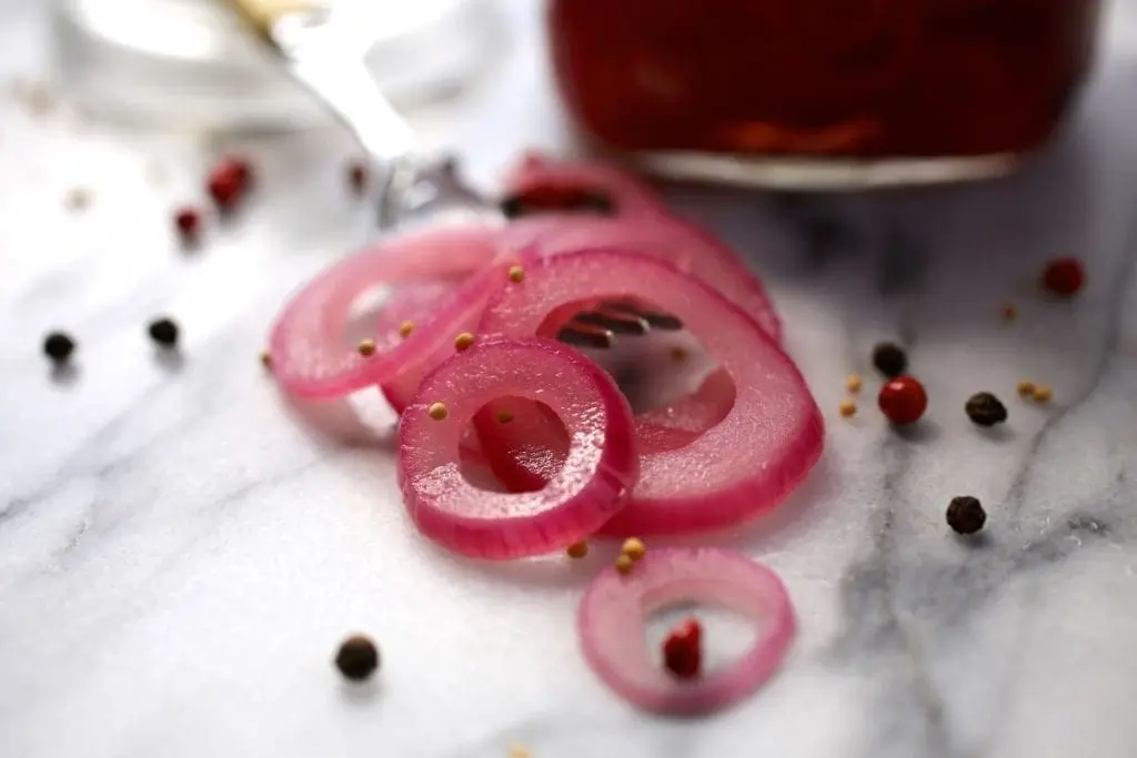 Sliced pickled red onions