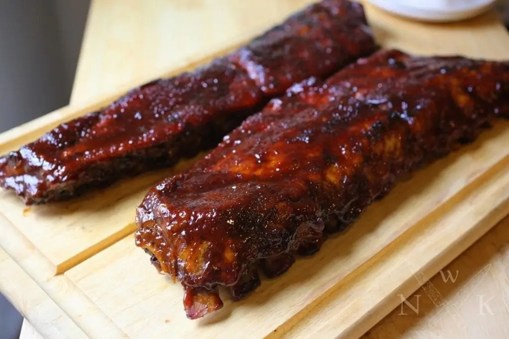 Glazed ribs on a board