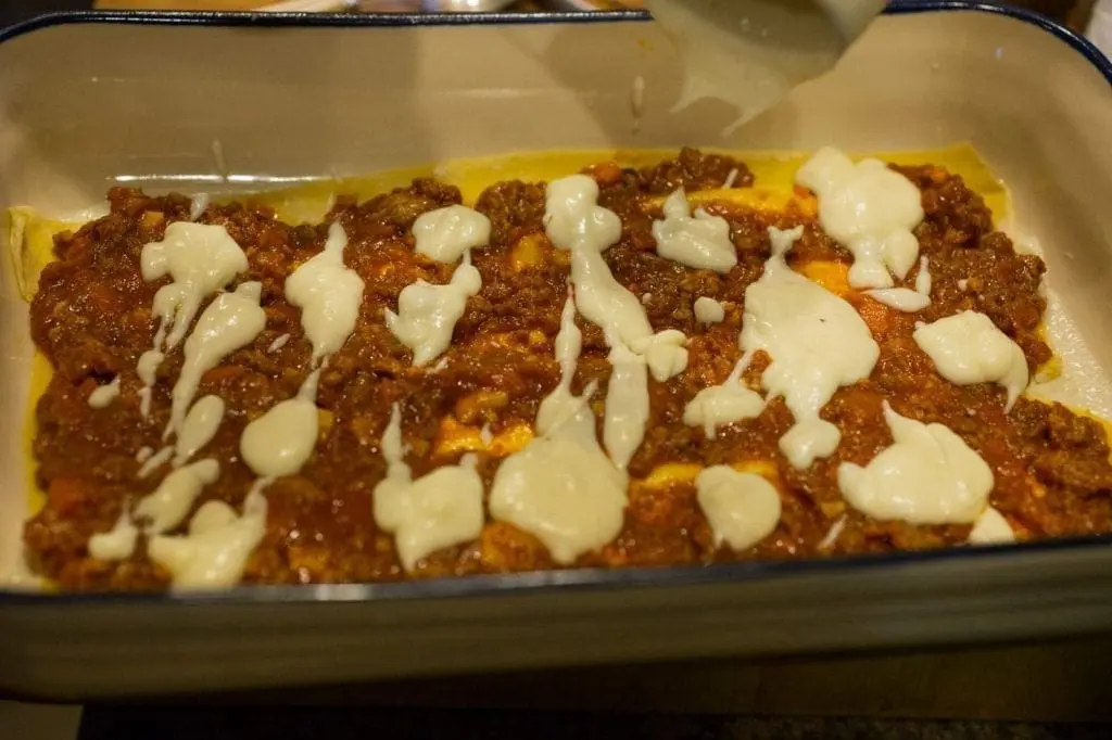 Lasagna being assembled