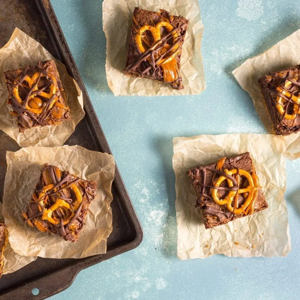 Fudgy, ultra-chocolatey brownies kicked up with a salty pretzel crust and caramel drizzle. 