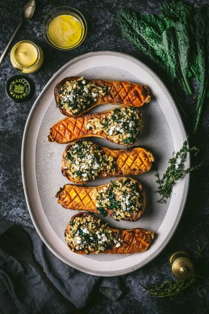 Butternut squash halves on a platter