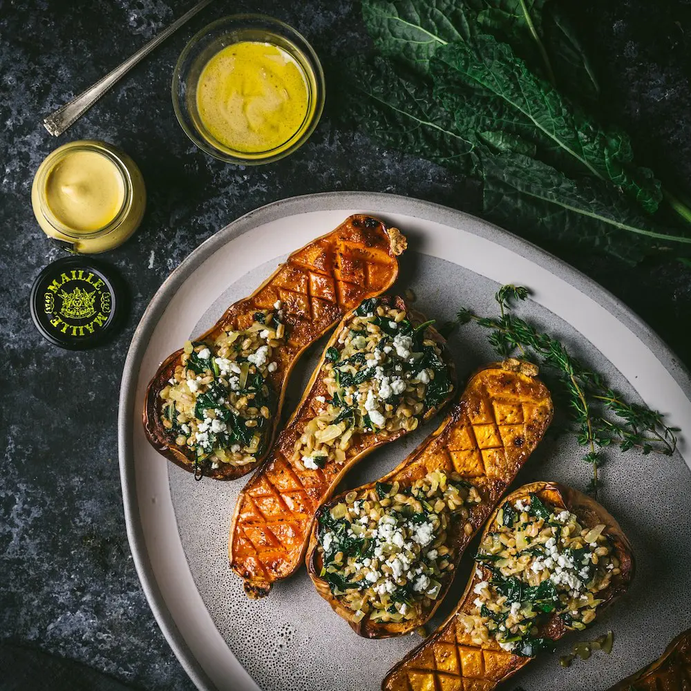 Mustard Glazed Butternut Squash Stuffed with Farro and Winter Greens
