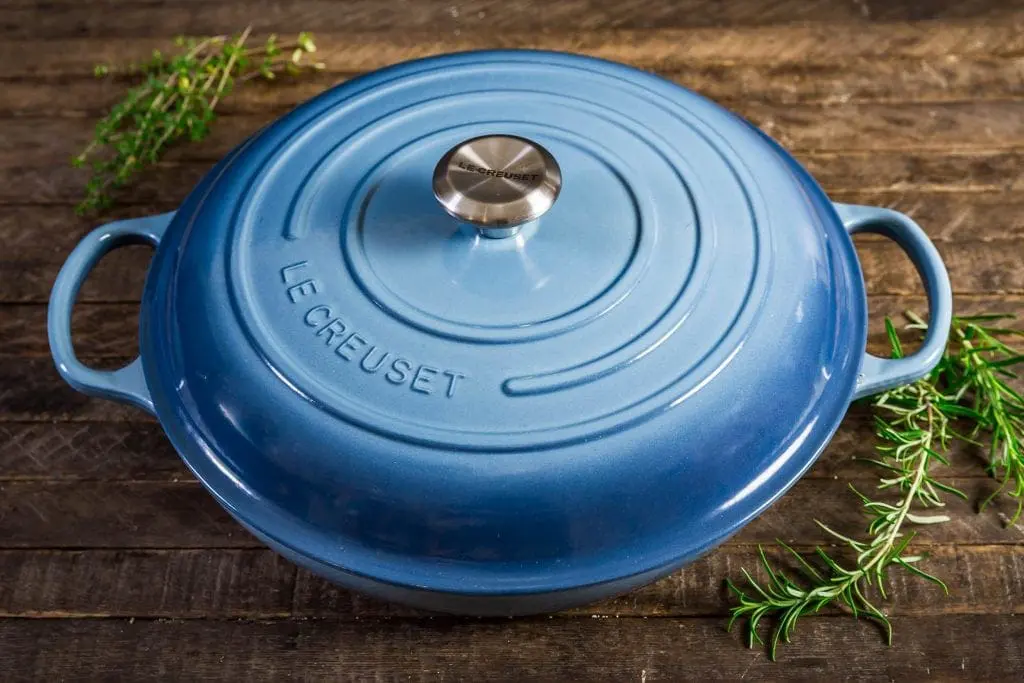 A blue Le Creuset braised