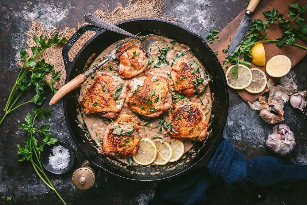Crispy Chicken Thighs with Creamy Black Garlic Sauce