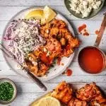 Grilled Buffalo Chicken Thighs with Blue Cheese Slaw