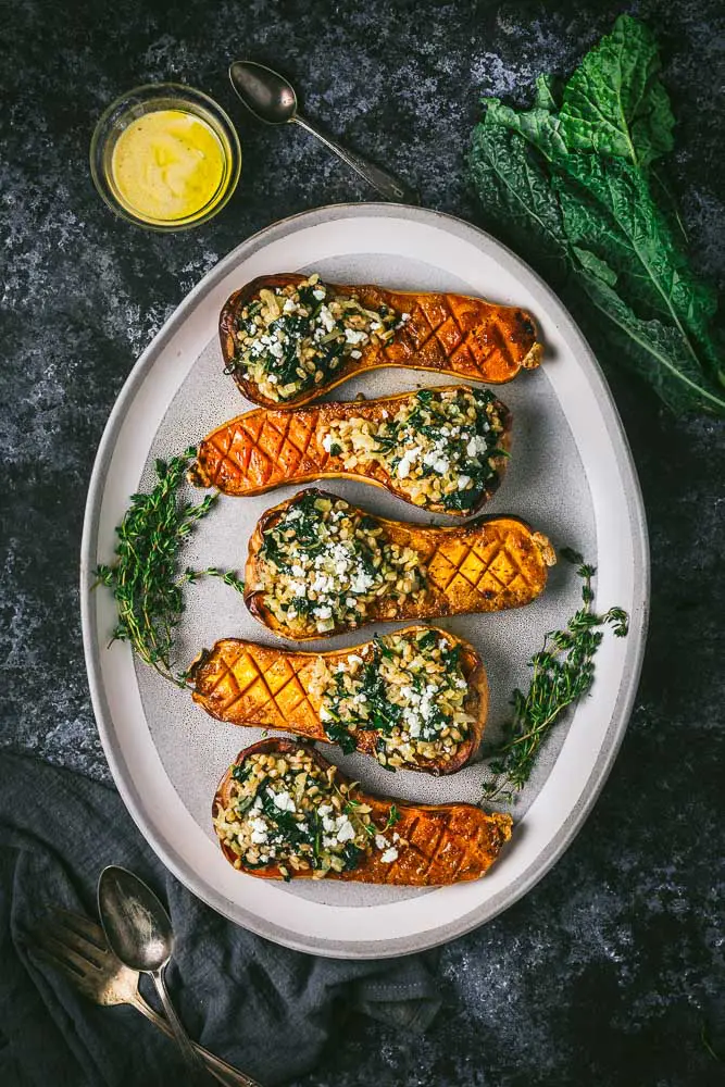 Mustard Glazed Butternut Squash Stuffed with Farro and Winter Greens
