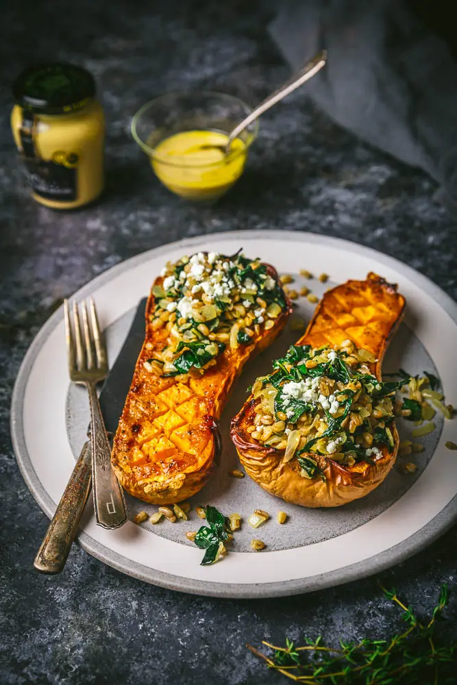 Mustard Glazed Butternut Squash Stuffed with Farro and Winter Greens