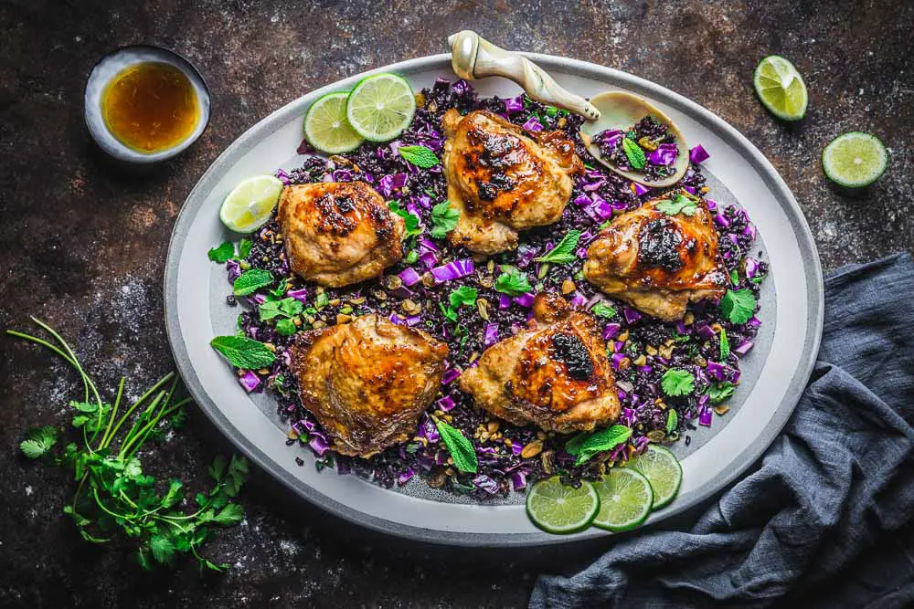 Chicken pieces on Black Rice and Cabbage Salad