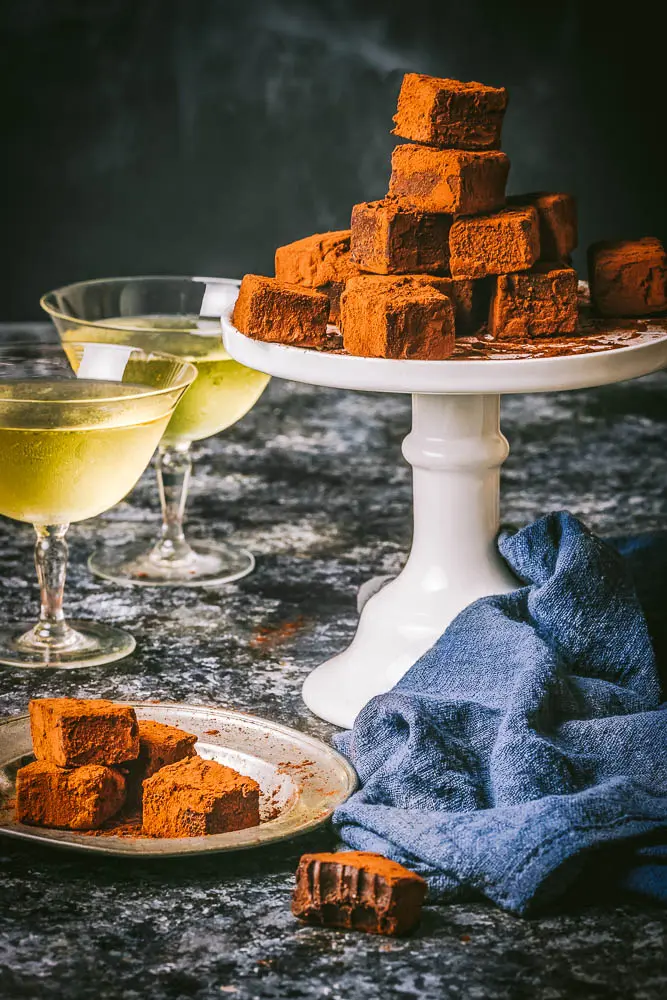 Chocolate truffles, one with a bite
