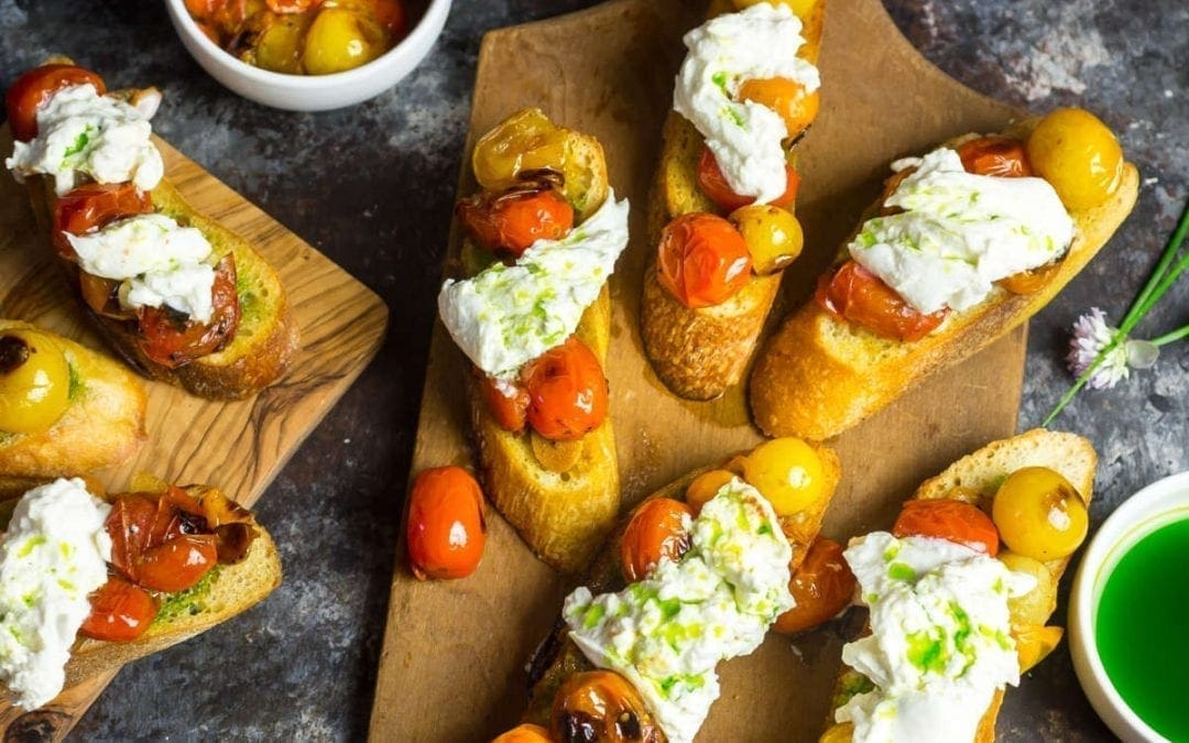 Crostini with Blistered Cherry Tomatoes, Burrata and Chive Oil