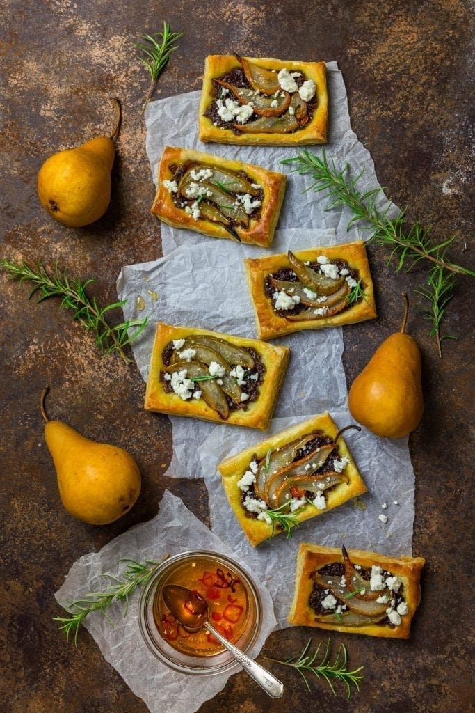 Pear & Caramelized Red Onion Tarts with Goat Cheese and Spicy Honey Drizzle