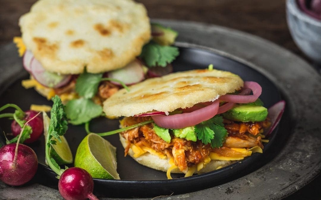 Arepas with Pulled BBQ Chicken, Cheddar, Pickled Onions and Avocado