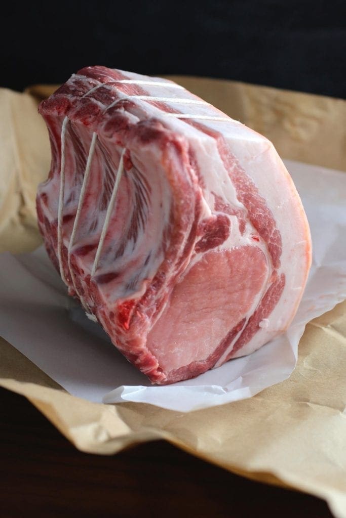 A rack of pork ribs on butcher paper