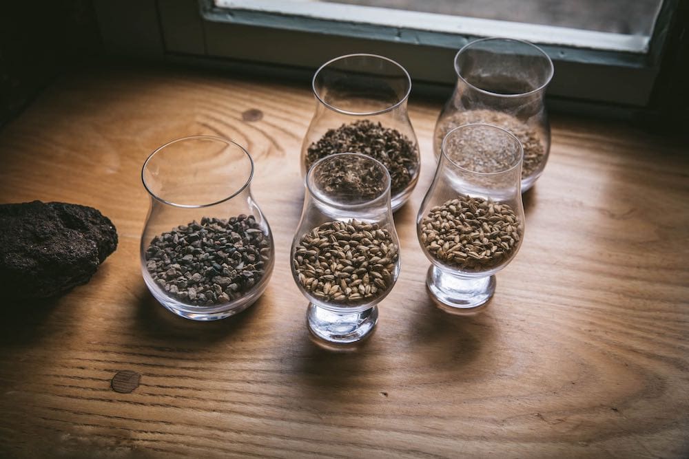 Glasses containing malted barley grains