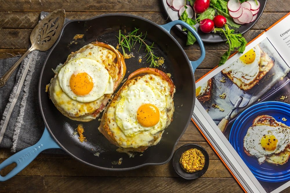 Two croquet madame sandwiches in a pan