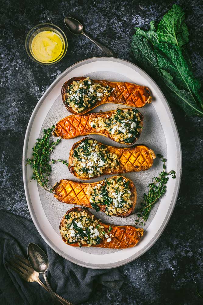 Mustard Glazed Butternut Squash Stuffed with Farro and Winter Greens